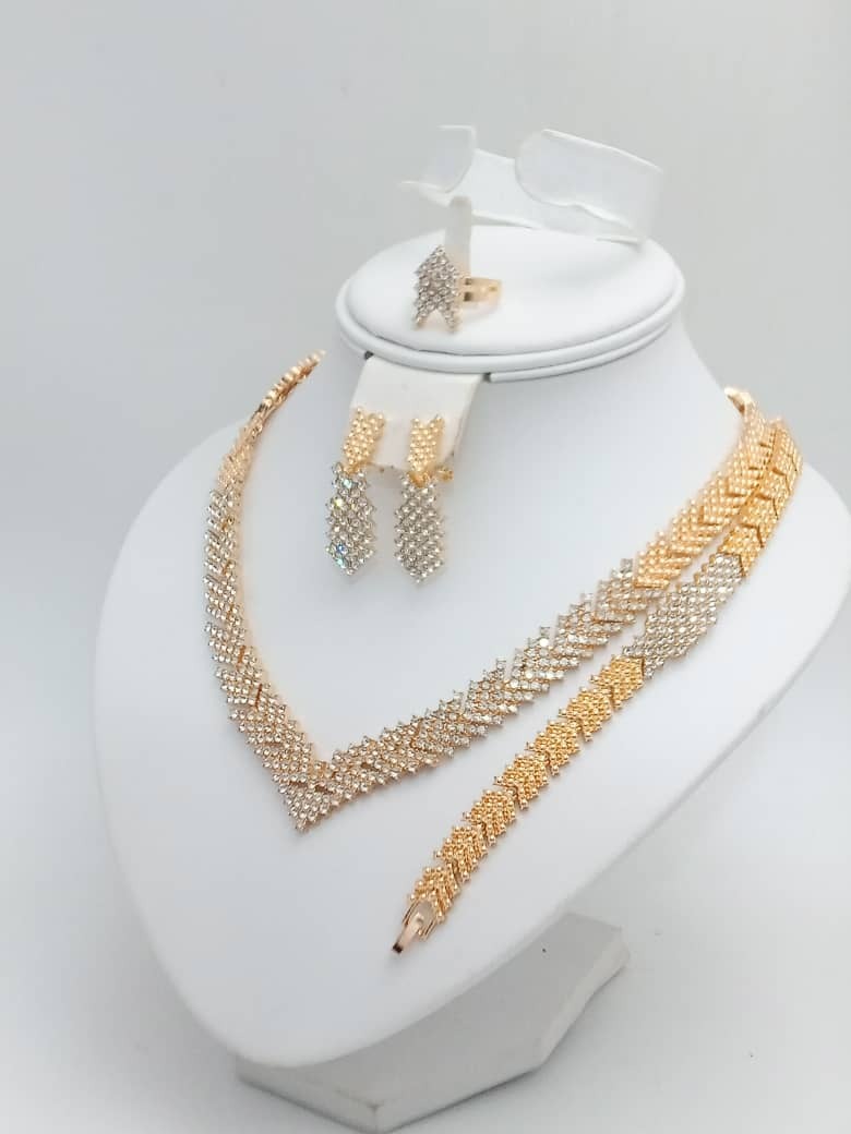 Elegant Gold & Silver Crystal Jewelry Set – Necklace, Earrings, Bracelet & Ring